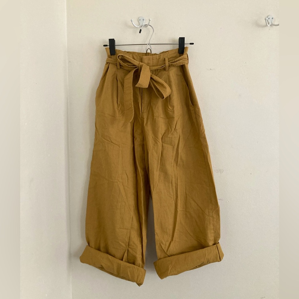 Mustard yellow XS Uniqlo paper-bag style trousers with tie belt.